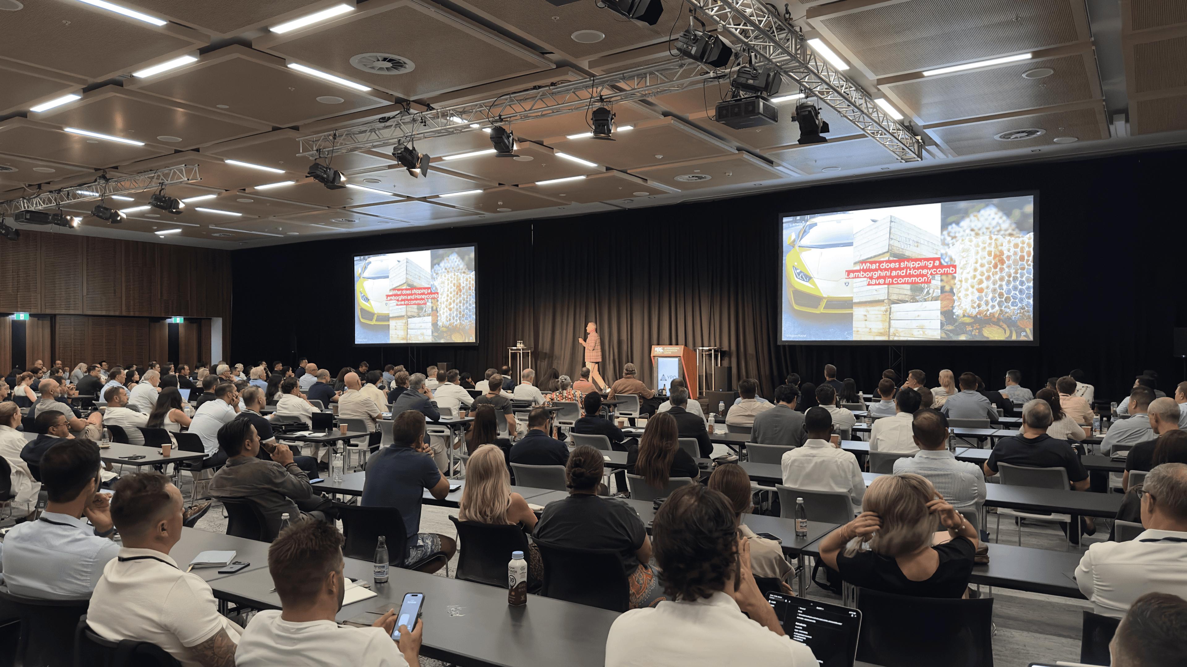 Rajeev delivering a keynote to a live audience
